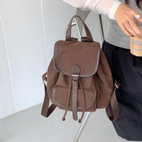 Lightweight Drawstring Flap Mini Backpack With Front Slip Pocket, Metal Slider Buckle Fastener And Integrated Top Carry Grip