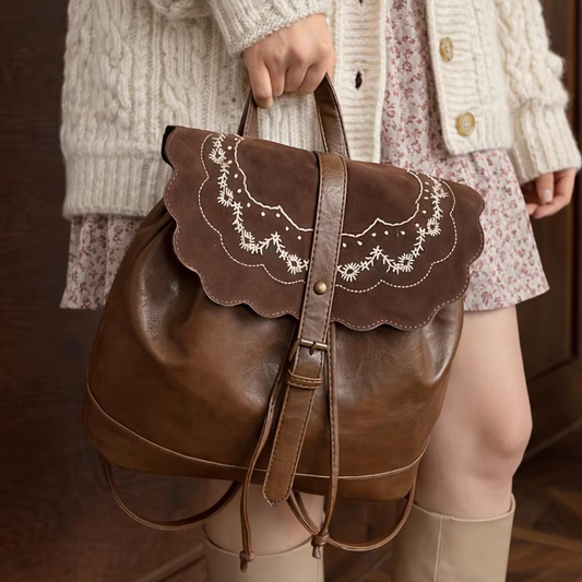 Deep Brown Scalloped Floral Embroidered Rounded Rucksack With Snap Flap Fastener, Drawstring Cinch Closure And Integrated Top Carry Loop